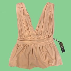 Lulu’s pastel pink blouse